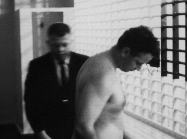 20James Earl Ray being searched 10.jpg